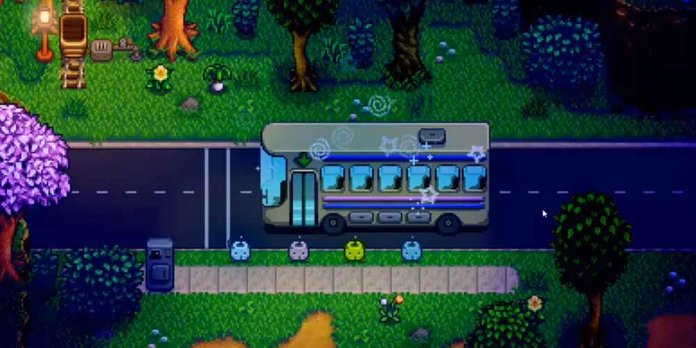 The repaired bus in Stardew Valley glowing at night after completing the Vault Bundle, unlocking access to the Calico Desert and Skull Cavern.